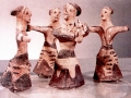 A CIRCLE OF WOMEN DANCING AROUND A WOMAN WITH A LYRE, Crete, c. 1500 b.c.e.